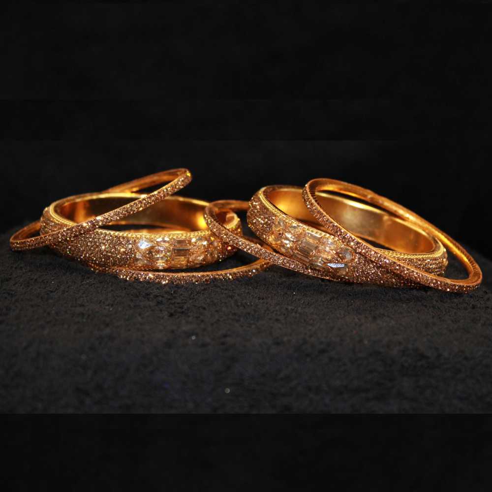 Beautiful Golden color with fine and crystal stone Designer Bangles