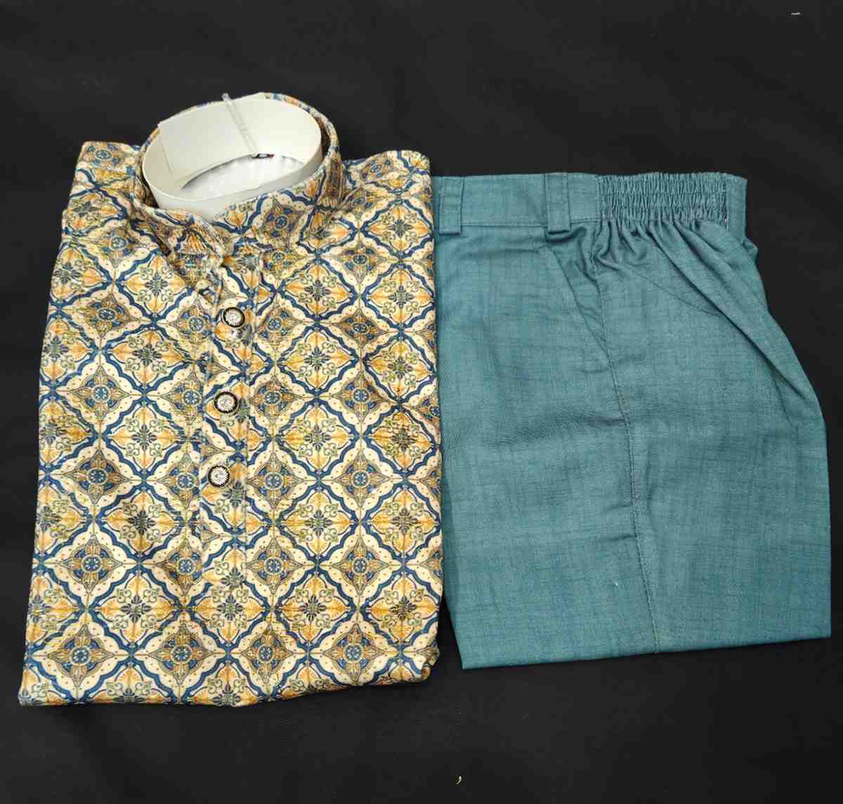 Teal Green Color With Print And Golden Thread Work Kurta Comes With Pant.