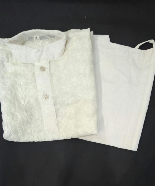 Cream Color Cotton Based Chikankari Work Kurta Comes With White Pajama.
