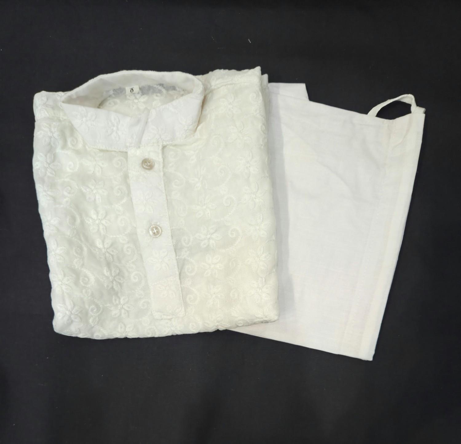 Cream Color Cotton Based Chikankari Work Kurta Comes With White Pajama.
