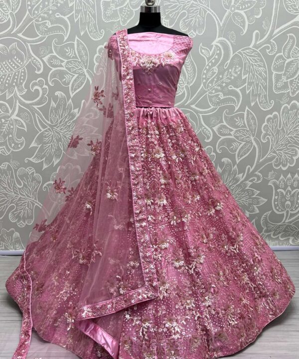 (SOLD) BEAUTIFUL PINK DESIGNER LEHENGA NETTING BASED HEAVY EMBROIDERY AND SEQUINCE WORK HEAVY FLARRED CAN CAN COMES WITH EMBROIDERY WORK BLOUSE AND NETTING DUPATTA