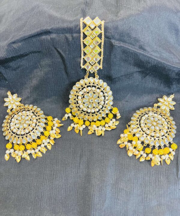 Reflect your inner beauty with this stunning mirror maangtika and earring set, perfect for any traditional occasion