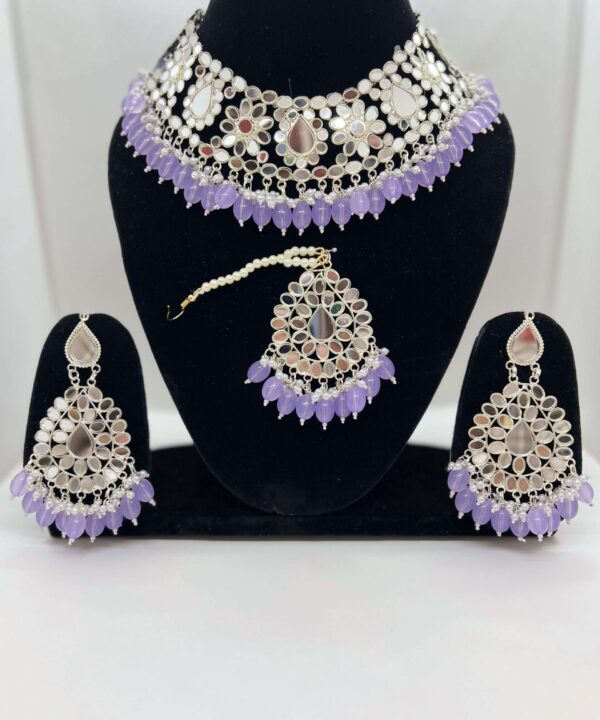 BEAUTIFUL LIGHT PURPLE COLOR BEADED SILVER PLATED MIRROR WORK CHOKER SET WITH STATEMENT EARRING AND TIKKA