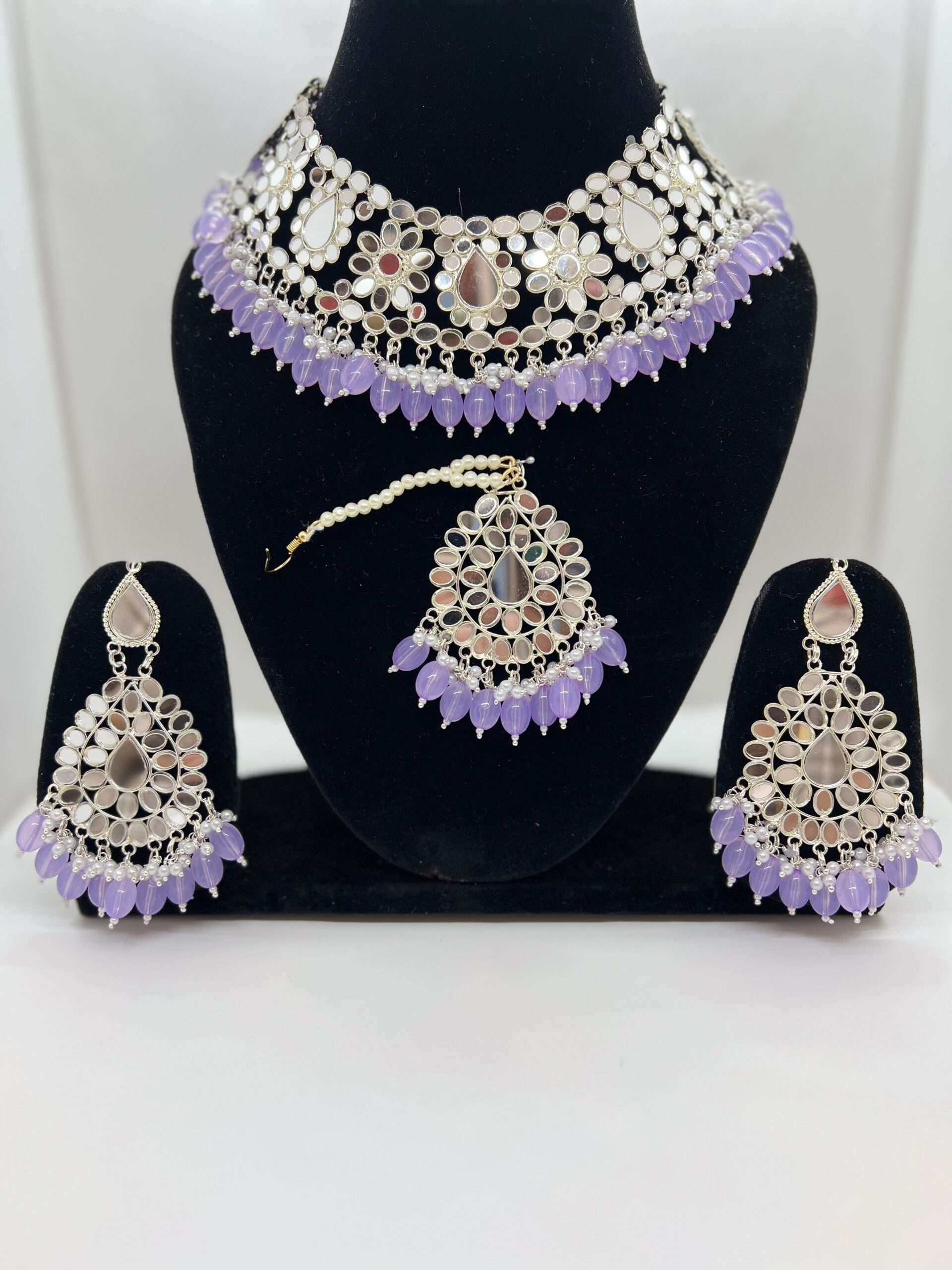 BEAUTIFUL LIGHT PURPLE COLOR BEADED SILVER PLATED MIRROR WORK CHOKER SET WITH STATEMENT EARRING AND TIKKA
