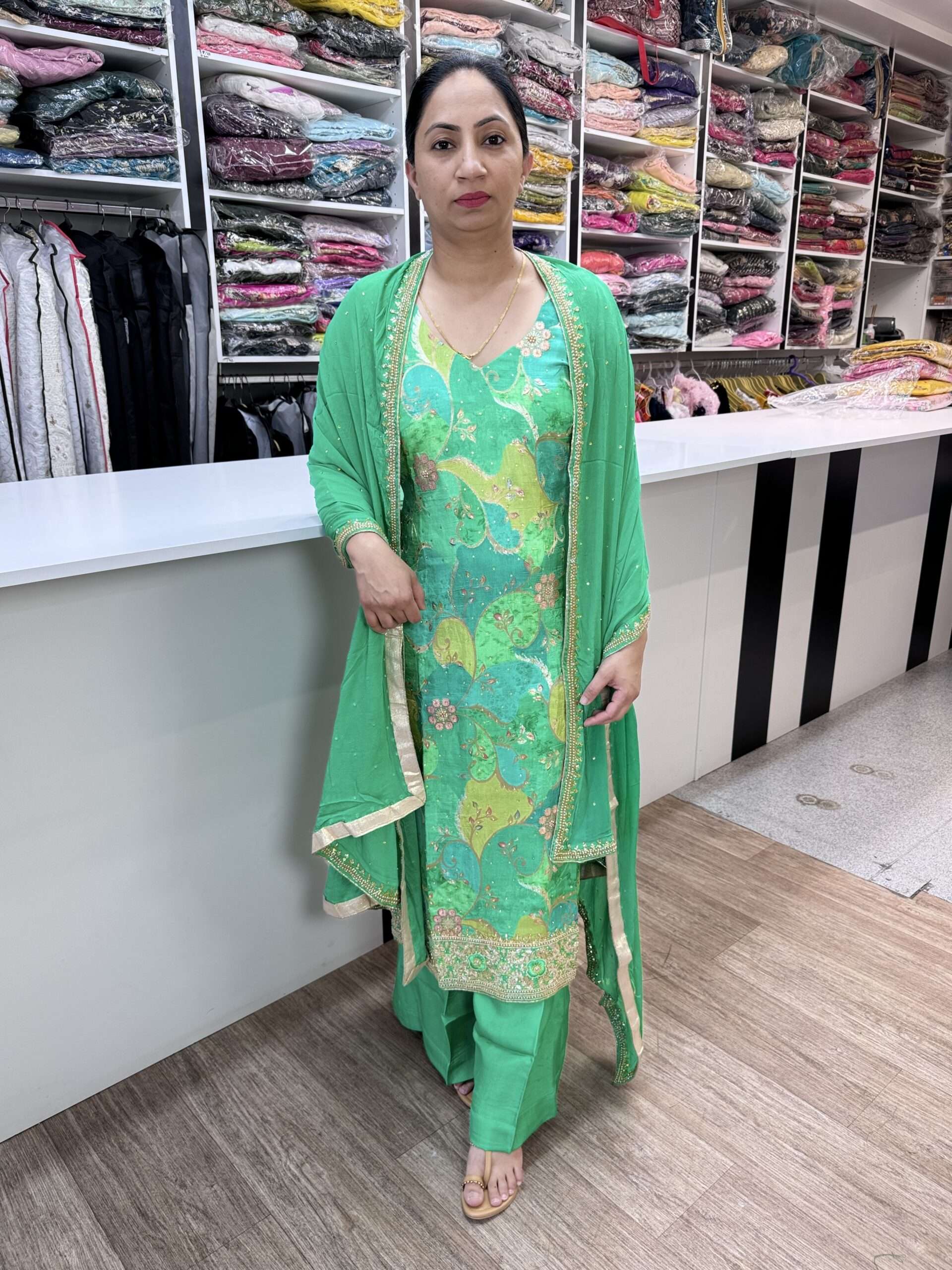 BROCADE FLORAL PRINT HEAVY 3 PIECE SUIT WITH ALL OVER BEAUTIFUL EMBROIDERY KUTDANA AND NALKI WORK ON SHRIT AND DUPATTA WITH PLAZZO PANT