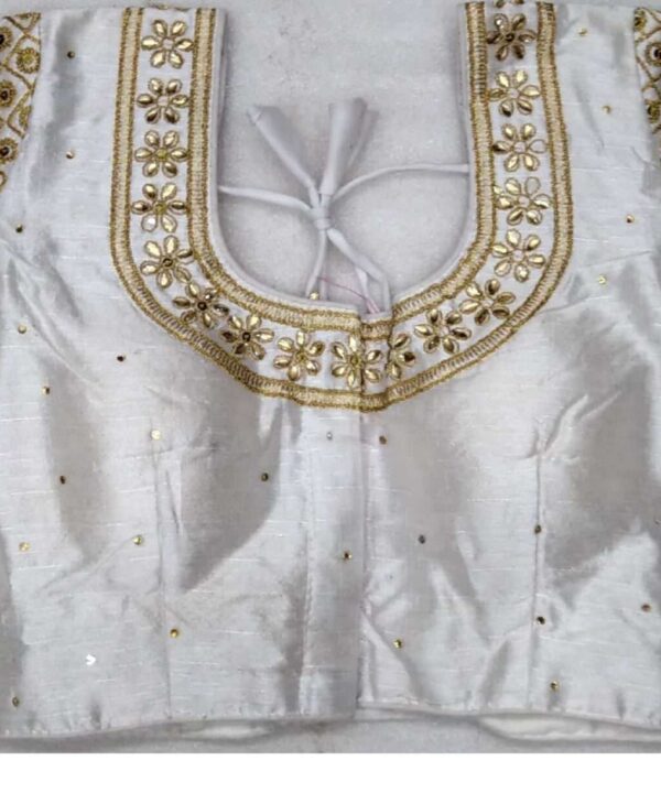 (Sold) WHITE COLOR DESIGNER BLOUSE WITH FRONT AND BACK EMBROIDERY AND STONE WORK.