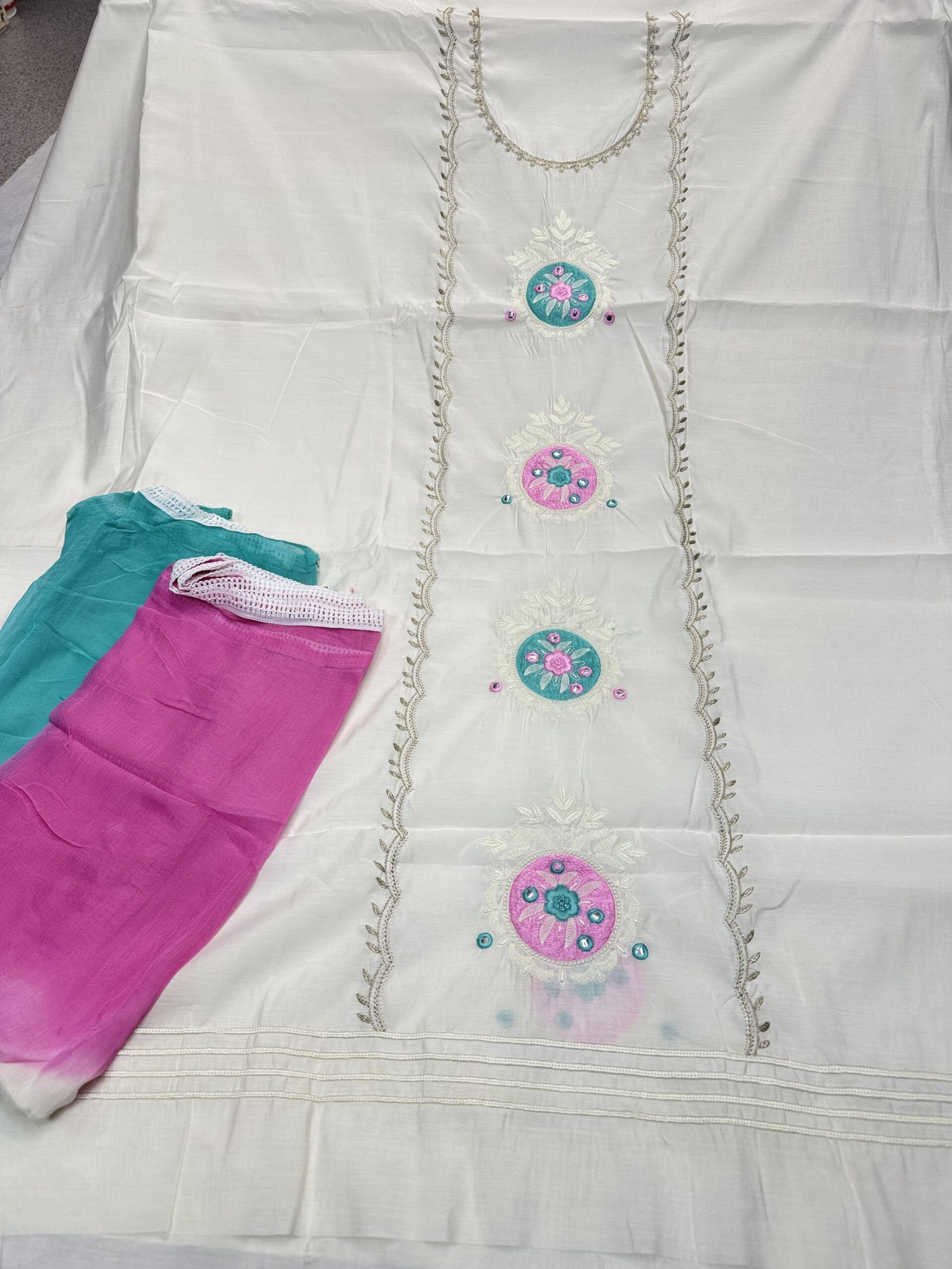 Beautiful Malmal Cotton Fabric Off White Color With Embroidery Work All Over Shirt Comes With Tie And Die Dupatta Four Side Lace Work