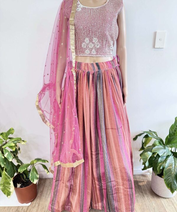 (SOLD) GEORGETTE BASED BEAUTIFUL DESIGNER BLOUSE WITH HEAVY STONE AND HAND WORK. FULLY FLARED WITH HEAVY KEN KEN SEQUINCE WORK LEHENGA NET DUPATTA WITH FOUR SIDE BEAUTIFUL LACE.   SIZE 40 (CAN BE CUSTOMISED UPTO 44)