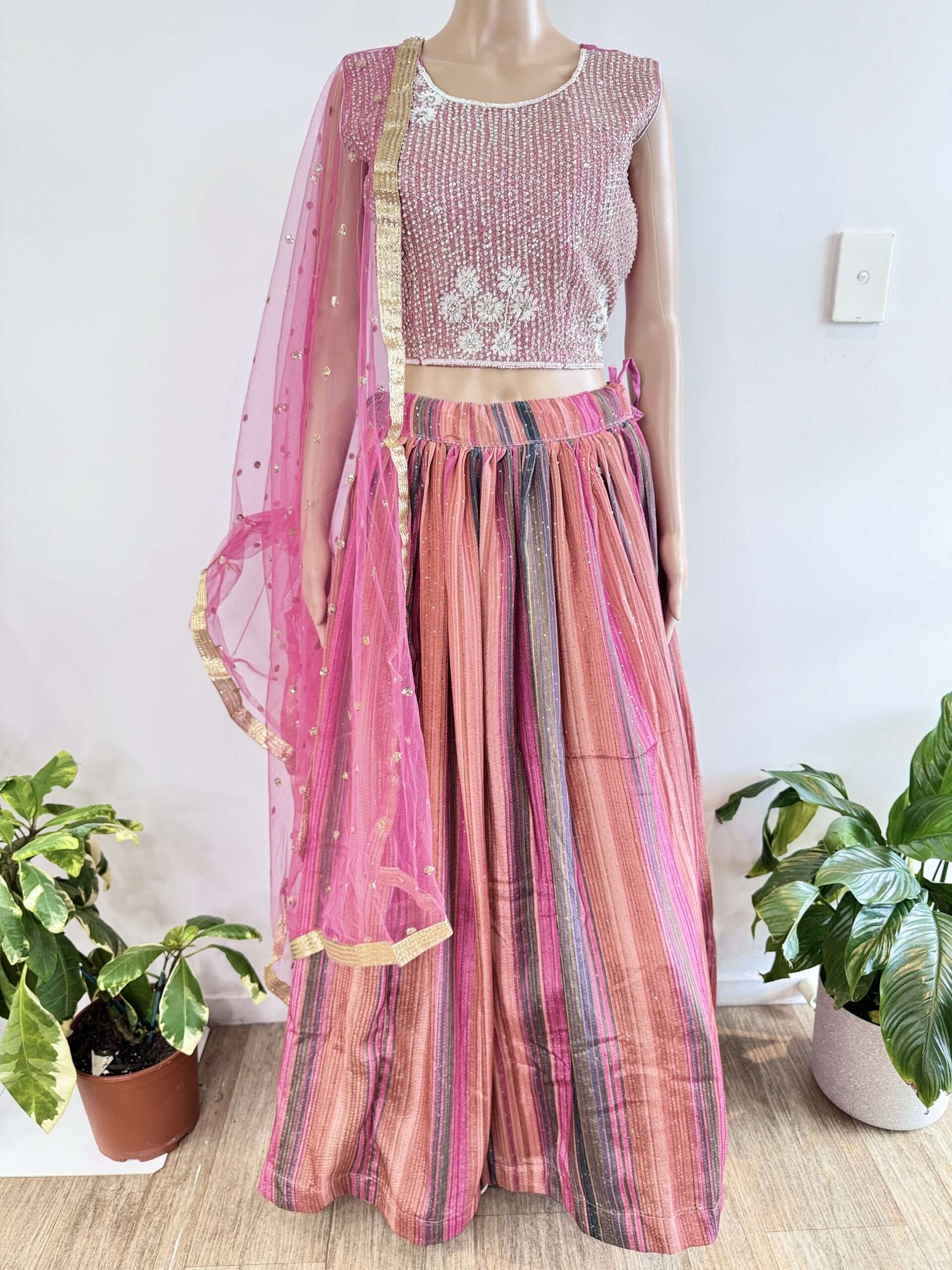 (SOLD) GEORGETTE BASED BEAUTIFUL DESIGNER BLOUSE WITH HEAVY STONE AND HAND WORK. FULLY FLARED WITH HEAVY KEN KEN SEQUINCE WORK LEHENGA NET DUPATTA WITH FOUR SIDE BEAUTIFUL LACE.   SIZE 40 (CAN BE CUSTOMISED UPTO 44)