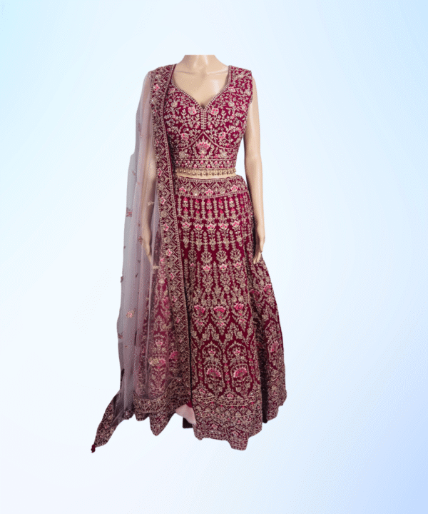 GEORGETTE BASED BEAUTIFUL EMBROIDED STONE AND MIRROR WORK WINE COLOR LEHENGA WITH HEAVY CHOLI COMES WITH CONTRAST DUPATTA