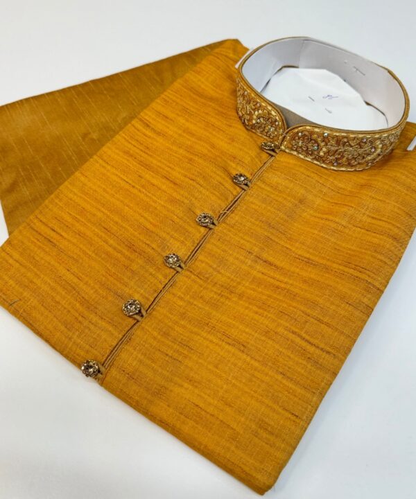 Designer Kurta Soft Silk Fabric Mustard (Haldi) Color With Neck Work And Stone Work Button Comes With Golden Color Pajama.