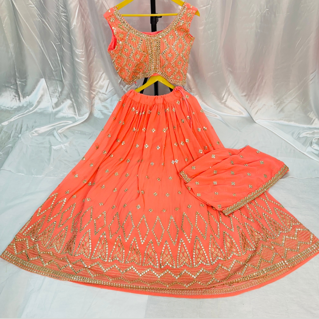 PEACH COLOR GEORGETTE FABRIC BEAUTIFUL CROP TOP EMBROIDERY AND STONE WORK COMES MATCHING DUPATTA EMBROIDERY AND FOUR SIDE LACE WORK.