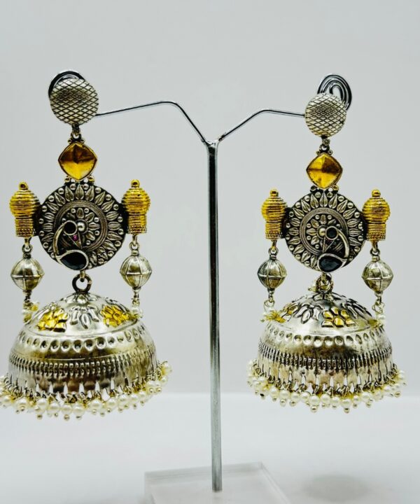 Beautiful Latest Design With Silver And Gold Plated Peacock Design Pearl And Black Color Stone Work Very Light Weight Jhumka Earrings