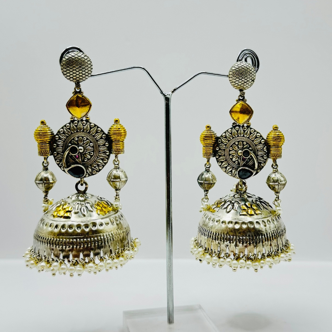 Beautiful Latest Design With Silver And Gold Plated Peacock Design Pearl And Black Color Stone Work Very Light Weight Jhumka Earrings