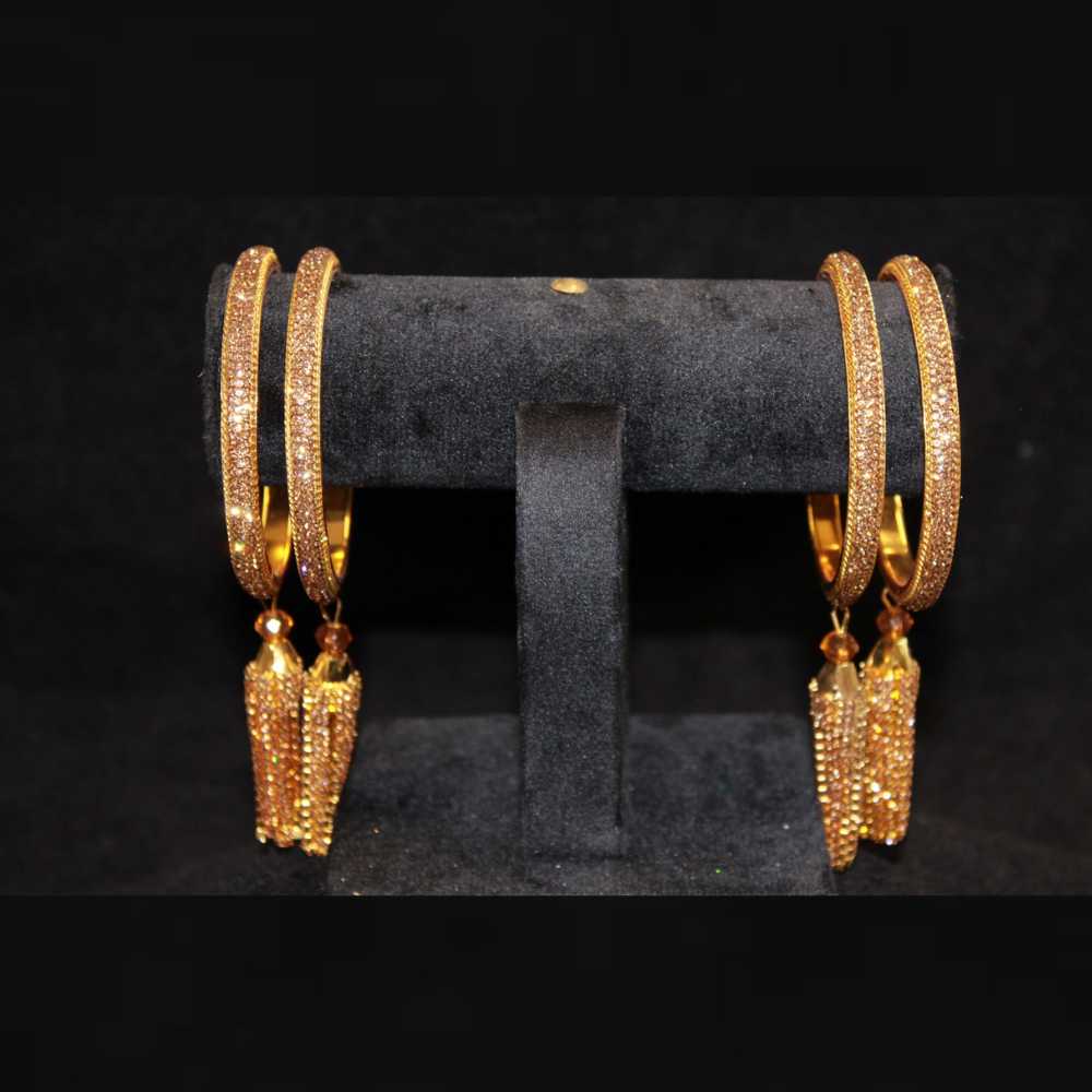 Beautiful Golden Bangles with hanging fine crystal stone work can be customized with velvet bangles
